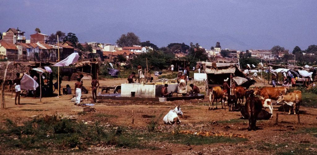Village rooftops and open landscape in rural India